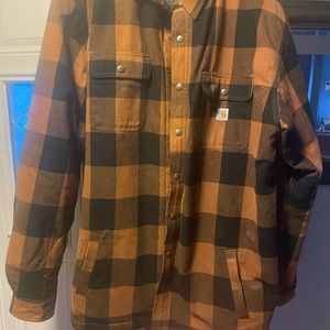 Carhartt lined Flannel . Worn once . Gift and it’s too big for me